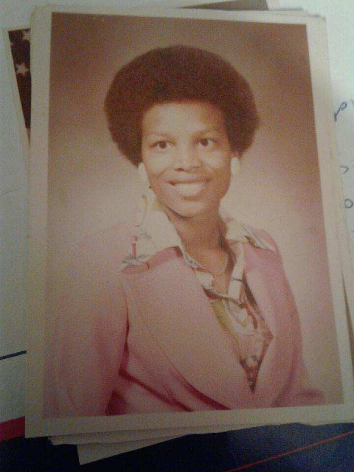 A vintage portrait photograph of Debra from earlier years