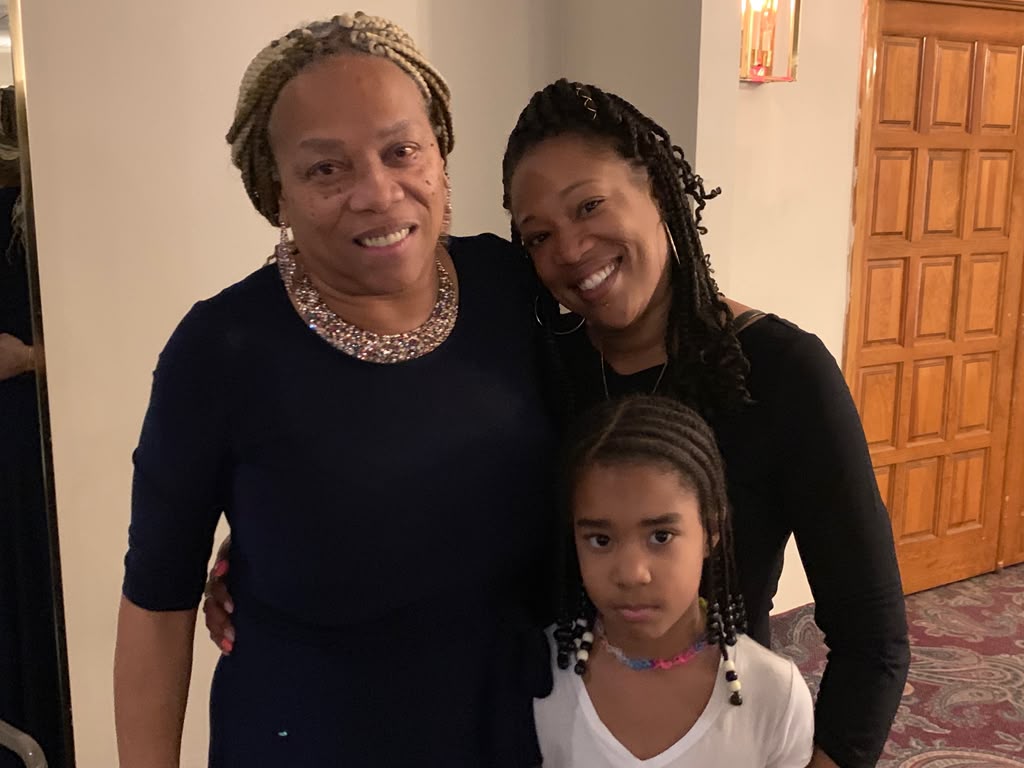 Debra with family members gathered for a special occasion