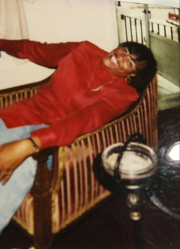 A vintage photograph of Debra relaxing at home in earlier years